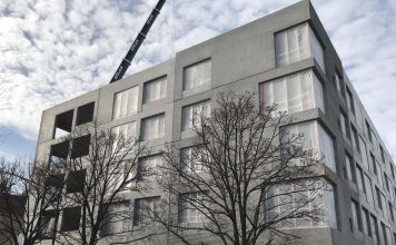 $10 million Albany Park affordable housing project reaches top off stage oso apartments at top off